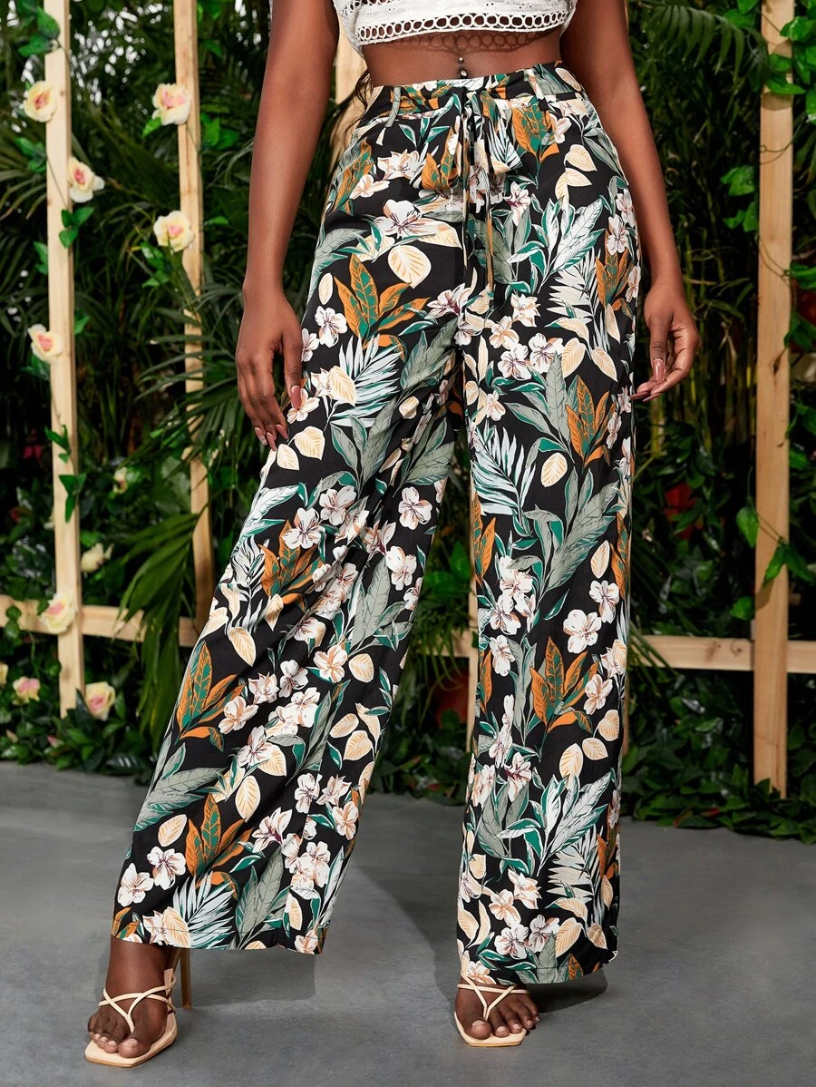 Pantalon ample à imprimé tropical ceinturé